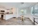 Bright dining area open to the kitchen, featuring modern finishes and natural light perfect for Gathering meals at 12282 Azure Gate Rd # 4, Las Vegas, NV 89183