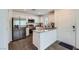 Stylish kitchen featuring stainless steel appliances, granite countertops, and ample cabinet space at 12282 Azure Gate Rd # 4, Las Vegas, NV 89183