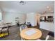 Bright, open-concept living space with modern flooring flowing into a well-appointed kitchen at 12282 Azure Gate Rd # 4, Las Vegas, NV 89183
