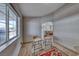 Bright bonus room with two chairs, large window, accent rug and view of the Gathering room at 1290 Dalene Ave, Henderson, NV 89002