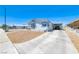Well-maintained home with a long driveway and a convenient carport at 1290 Dalene Ave, Henderson, NV 89002