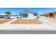 Charming single-story home with a well-maintained yard and a private driveway at 1290 Dalene Ave, Henderson, NV 89002