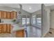 Bright kitchen area with a breakfast bar and a view of the outdoor seating area at 1290 Dalene Ave, Henderson, NV 89002