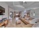 Open-concept living space with tile flooring, vaulted ceilings, and natural light at 1290 Dalene Ave, Henderson, NV 89002