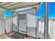 View of blue and white shed for additional storage on the property at 1290 Dalene Ave, Henderson, NV 89002