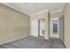 Carpeted bedroom with a large closet and neutral-toned walls for versatile decorating at 1306 Big Tree Ave, North Las Vegas, NV 89031