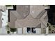 Aerial view of the home's roof, driveway, and surrounding neighborhood featuring roof type at 1346 Crystal Hill Ln # 3, Henderson, NV 89012