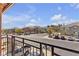 Balcony view showcasing a well-maintained street and neighborhood with lush landscaping at 1346 Crystal Hill Ln # 3, Henderson, NV 89012