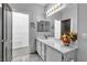 Bathroom with ample counter space, walk-in closet, and a stylish vanity with a mirror at 1346 Crystal Hill Ln # 3, Henderson, NV 89012