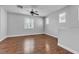 Bright bedroom with wood flooring, multiple windows, and neutral walls at 1346 Crystal Hill Ln # 3, Henderson, NV 89012