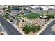 Scenic aerial view of the community park with playground, walking paths, and open green space at 1346 Crystal Hill Ln # 3, Henderson, NV 89012