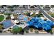 Aerial view of the community park with splash pad, playground, basketball court, and shaded picnic spots at 1346 Crystal Hill Ln # 3, Henderson, NV 89012