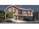 Inviting two-story townhome with an attached garage, and driveway parking at 1346 Crystal Hill Ln # 3, Henderson, NV 89012