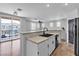 Stylish kitchen with stainless steel sink, ample counter space, and balcony access at 1346 Crystal Hill Ln # 3, Henderson, NV 89012