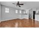 Spacious living room with hardwood floors, recessed lighting, and neutral paint at 1346 Crystal Hill Ln # 3, Henderson, NV 89012