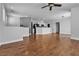 Inviting living room with hardwood floors seamlessly connecting to the stylish kitchen at 1346 Crystal Hill Ln # 3, Henderson, NV 89012