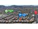 Wide aerial view highlighting nearby Reunion Trails Park, S. Stephanie St., and the community pool at 1346 Crystal Hill Ln # 3, Henderson, NV 89012