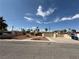 Charming single-story home with a well-maintained yard and a convenient attached garage at 1590 Raindance Way, Las Vegas, NV 89169