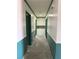 Well-lit hallway with storage cabinets at 1590 Raindance Way, Las Vegas, NV 89169