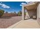 Spacious backyard with a covered patio and low-maintenance landscaping at 1816 Eagle Mesa Ave, Henderson, NV 89012