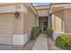 View of the front entrance of the home with a well maintained walkway at 1816 Eagle Mesa Ave, Henderson, NV 89012