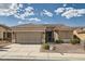 Charming single-story home featuring a desert landscape, and a two-car garage at 1816 Eagle Mesa Ave, Henderson, NV 89012