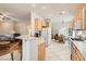 Open floor plan kitchen with view to the living and dining areas at 1816 Eagle Mesa Ave, Henderson, NV 89012