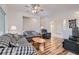 Bright living room featuring hardwood floors, furniture and natural light at 1816 Eagle Mesa Ave, Henderson, NV 89012