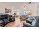 Open-concept living room with hardwood floors and plenty of natural light at 1816 Eagle Mesa Ave, Henderson, NV 89012