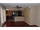 An open-concept living area featuring wood floors and a kitchen visible in the background at 1851 Hillpointe Rd # 1711, Henderson, NV 89074