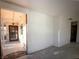 Bright living room featuring an open entryway with a secured door and covered porch at 2217 Santa Ynez Dr, Las Vegas, NV 89104
