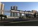 Modern cityscape with monorail, buildings, and palm trees, highlighting the convenience of urban living at 2217 Santa Ynez Dr, Las Vegas, NV 89104