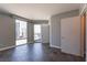 Bright bedroom featuring floor-to-ceiling windows with city views, complemented by stylish wood flooring and neutral tones at 222 Karen Ave # 2804, Las Vegas, NV 89109