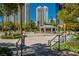 This meticulously landscaped pool area has a shaded eating area and numerous lounge chairs for residents at 222 Karen Ave # 2804, Las Vegas, NV 89109
