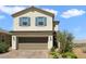 Charming two-story home with a well-maintained front yard and a two-car garage at 2343 Teatro Ave, Henderson, NV 89044