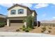 Charming two-story home with desert landscaping and a two-car garage at 2343 Teatro Ave, Henderson, NV 89044