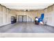 Spacious two car garage with shelving and ample storage space at 2343 Teatro Ave, Henderson, NV 89044