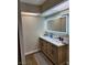 Bathroom featuring a modern vanity with an illuminated mirror at 2645 Lindell Rd, Las Vegas, NV 89146