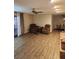 Spacious living room features wood floors and ample seating with two recliners at 2645 Lindell Rd, Las Vegas, NV 89146