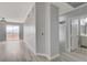 Hallway view includes a large glass door to patio and an adjacent bathroom at 27 E Agate Ave # 505, Las Vegas, NV 89123