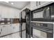 Updated kitchen features granite countertops and stainless steel appliances at 27 E Agate Ave # 505, Las Vegas, NV 89123