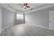 Main bedroom with fan, natural light and hardwood floors at 27 E Agate Ave # 505, Las Vegas, NV 89123