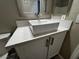 Bathroom sink and vanity area featuring quartz countertops and square sink at 2704 Willow Wren Dr, North Las Vegas, NV 89084
