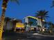 Night view of illuminated casino with palm trees at 2704 Willow Wren Dr, North Las Vegas, NV 89084