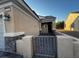 Charming front entrance with stucco pillars and tiled walkway at 2704 Willow Wren Dr, North Las Vegas, NV 89084