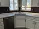 Close up of the kitchen sink and the faucet at 2704 Willow Wren Dr, North Las Vegas, NV 89084
