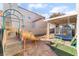 Backyard featuring a playset, trampoline and patio area, perfect for outdoor fun at 2789 Trotwood Ln, Las Vegas, NV 89108