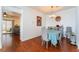 Bright dining room features a round table, hardwood floors, and natural light at 2789 Trotwood Ln, Las Vegas, NV 89108