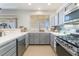 Kitchen boasts stainless steel appliances and ample counter space at 2789 Trotwood Ln, Las Vegas, NV 89108