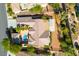 Home with a private backyard featuring desert landscaping, covered patio, and a sparkling pool enclosed by a fence at 3029 Brownbirds Nest Dr, Henderson, NV 89052